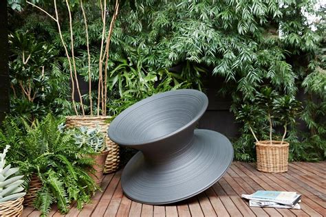 Causing quite a stir at its launch at the milan salone in 2010, spun is made from rotational moulded polyethylene and as such is suitable for outdoor use. Magis Spun Chair - Papillon Garden Landscape Design