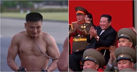Shirtless North Korean Soldiers Break Bricks With Their Heads Lay On