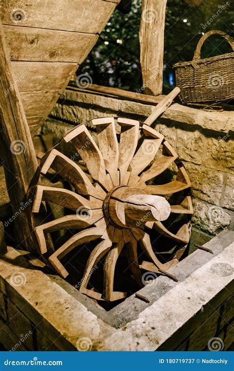 The Wheel Of A Water Mill The Old Wooden Wheel Of The Water Mill Is