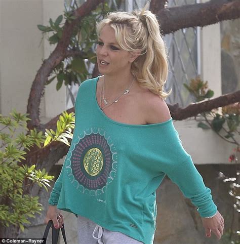 Britney Spears Flaunts Her Toned Physique In An Off Shoulder Sweater Sans Bra While Strolling