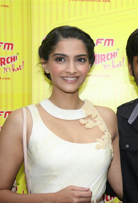 sonam kapoor super sexy cleavage show in white dress at film raanjhanaa music launch in radio