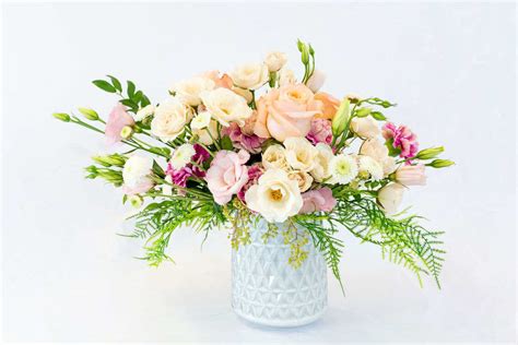 Maybe you would like to learn more about one of these? Elegant fresh flowers in a white modern vase in Byron ...