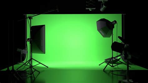 A Green Screen In A Dark Room With Lights