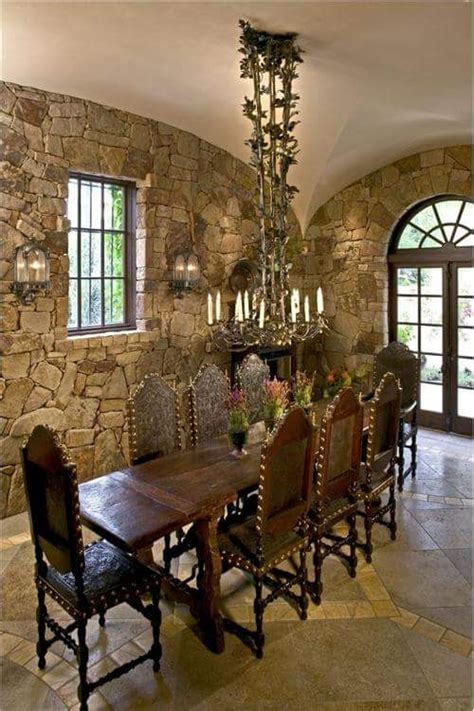 Suede chairs and a hide rug add rustic charm to this elegant dining room, making it as welcoming as stylish. 15 Rustic, Renaissance, Medieval Dining Rooms Part 1 ...