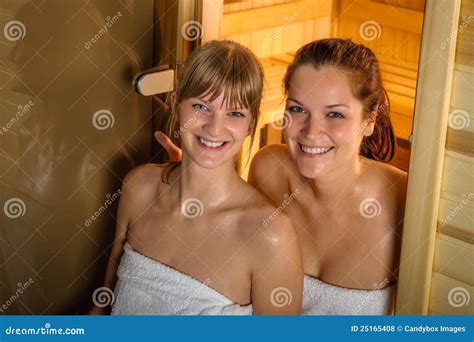 Two Women At Sauna Wrapped In Towel Stock Photo Image Of Center Relaxation