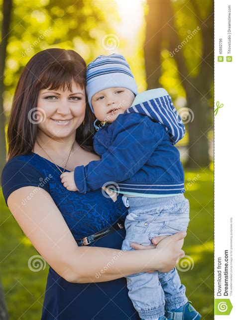 Happy Mother And Baby In The Summer Park Stock Photo Image Of