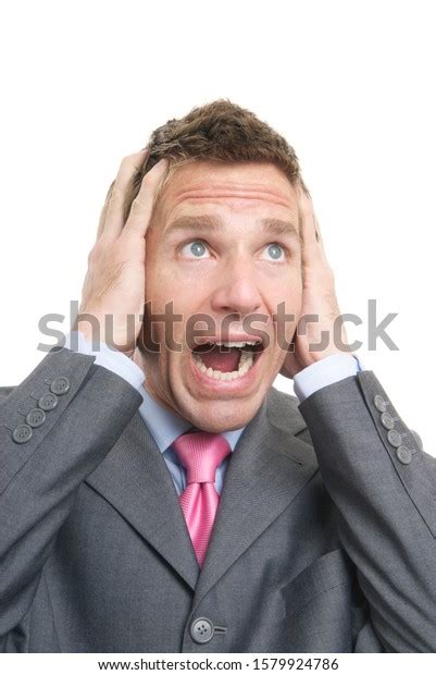 Stressed Businessman Holding His Head Screaming Stock Photo 1579924786