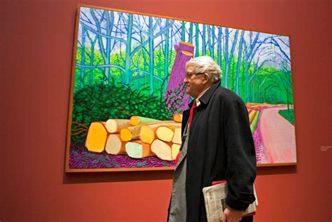 David Hockney Walking In Front Of One Of His Paintings Shown At Museum
