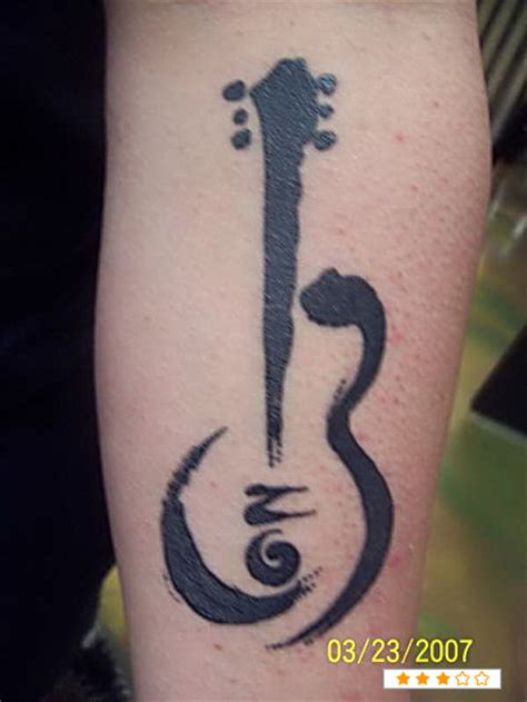 Music Guitar Tattoo On Hand