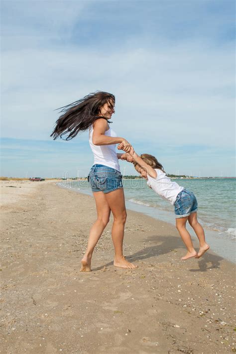 Mother And Her Daughter Having Fun On The Beach Stock Image Image Of Beautiful Infant 46408781