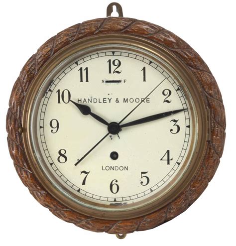 A Late 19th Century English Wall Clock Signed Handley And Moor