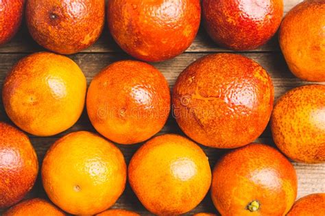 Sweet Juicy Red Oranges On The Rustic Background Stock Photo Image Of