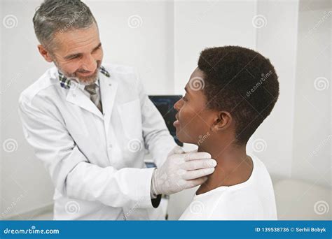 Examination Of Lymph Nodes In Clinic Stock Photo Image Of Caucasian