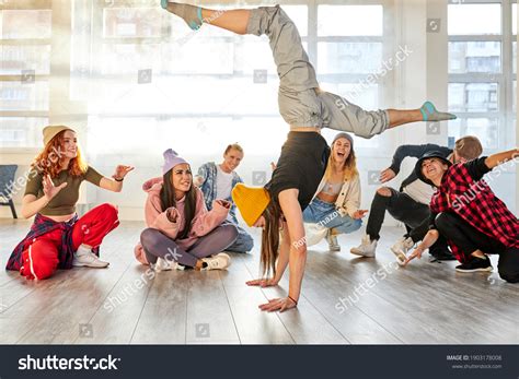 Break Dancer Woman Showing Different Tricks Stock Photo 1903178008