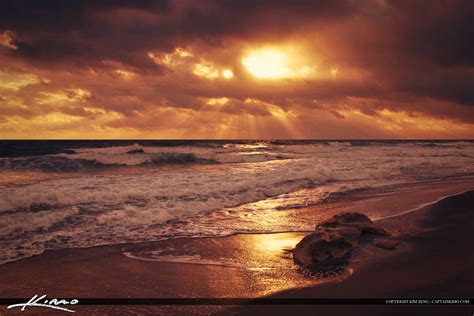 Sun Rays Through The Clouds Over The Ocean At Beach Royal Stock Photo