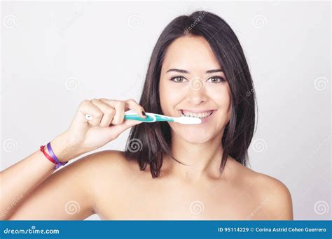 Young Woman Brushing Her Teeth Isolated Over White Background Stock Image Image Of Caucasian