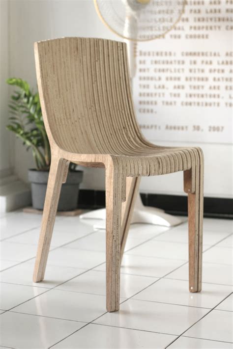 Cnc cuts seamless teak furniture joined using stainless. The Layer Chair | DyvikDesign.com