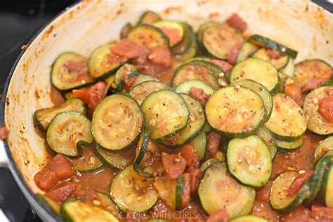 Sautéed Zucchini And Tomatoes Cooking With Curls