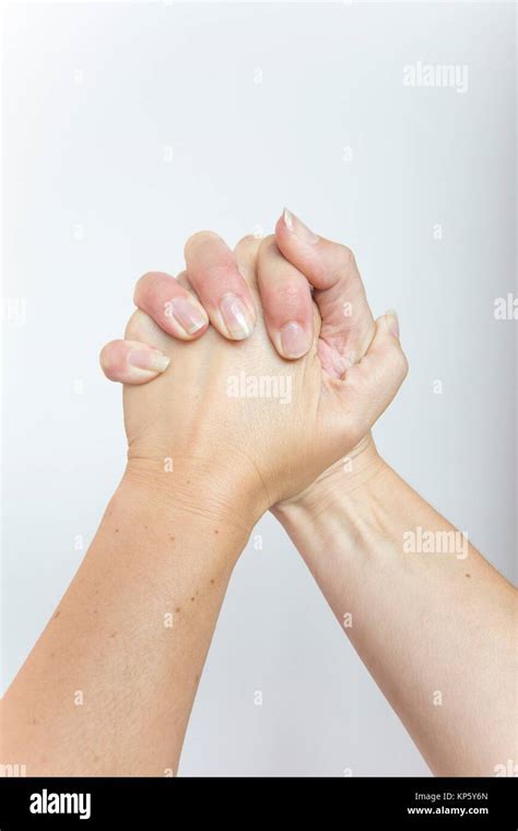 Squeezing Hands Stock Photo Alamy