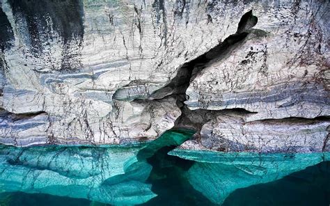 In Photos: Patagonia's Stunning Marble Caves | Marble caves chile, Underwater caves, Natural wonders