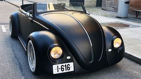 A Classic Volkswagen Beetle Is Repainted Black Matte