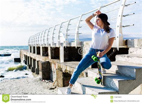 Woman With A Skateboard On A Beach Stock Image Image Of Model Ocean