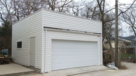 A front and a back overhang will add style to your construction. Flat Roof Garage | 2 Story Garage | Pinterest | Flat roof ...