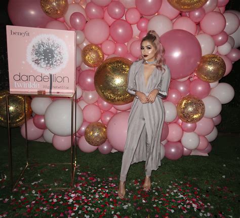 Every woman should have that one item in her closet that makes her feel powerful. Love the pink balloons for a photo back drop | 30th ...