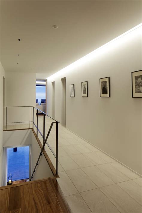 16 Clean And Simple Modern Hallway Designs That Do More Than Their Job