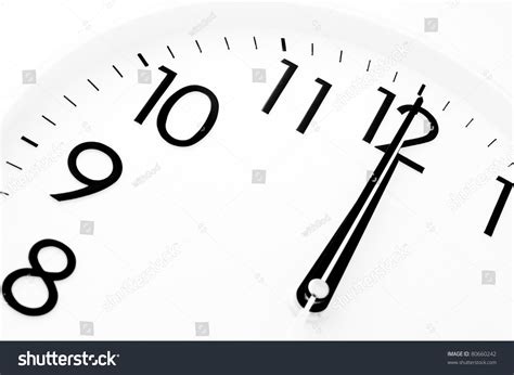 A White Clock Twelve Oclock Midnight Or Midday Stock Photo