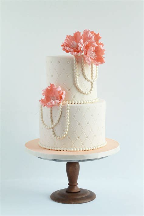 Vintage Romantic Ivory And Peach Wedding Cake With Pearls And Coral