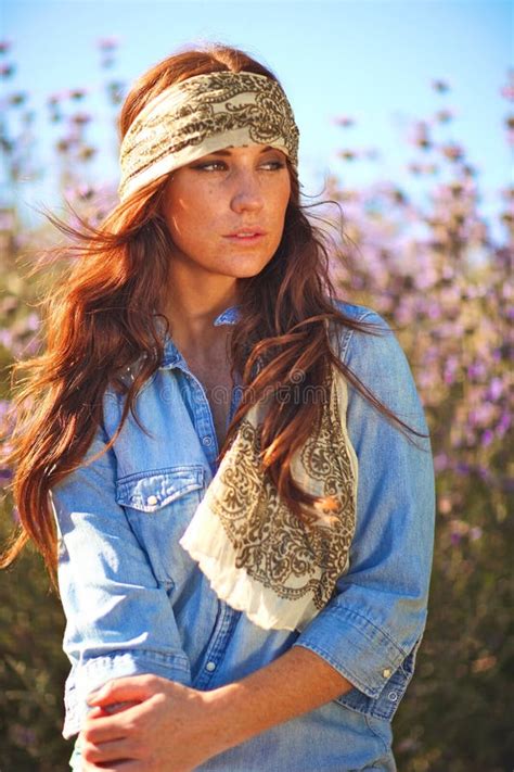 Young Beautiful Woman On A Field In Summer Time Stock Photo Image Of