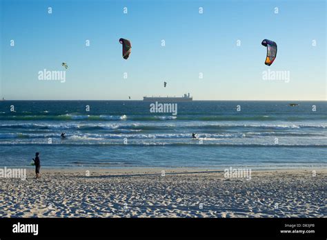 Kite Surfers At Sunset From Bloubergstrand Cape Town South Africa Stock