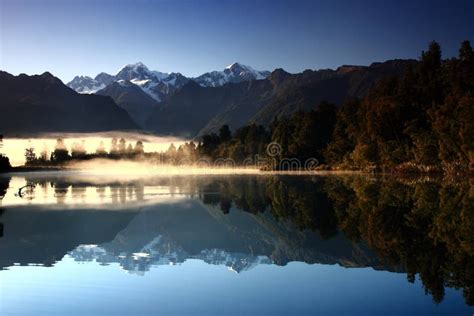 Reflection On Lake Matheson New Zealand Stock Photo Image Of Lake