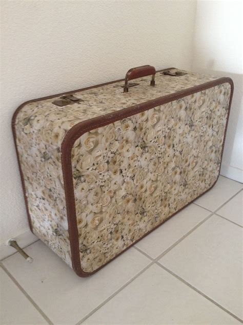 Covered An Old Suitcase With Wrapping Paper With Watered Down Glue