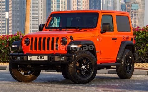 Alquila Un Jeep Wrangler Naranja 2018 Id 03815 En Dubai Rentyae