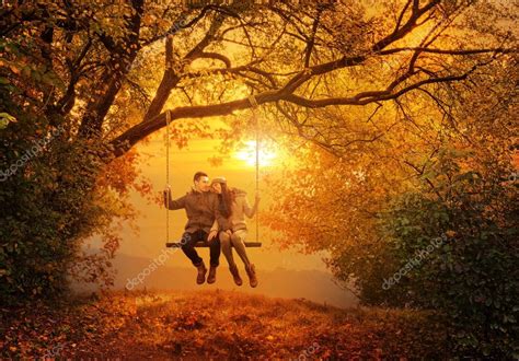 Romantic Couple Swing In The Autumn Park Stock Photo By ©geribody 38111301