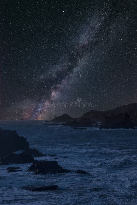 Vibrant Milky Way Composite Image Over Landscape Of Long Exposure Sea