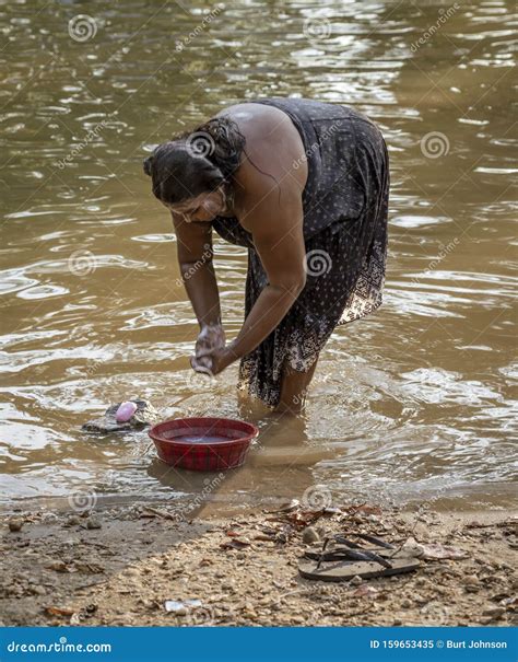 Kataragama Sri Lanka 29109 03 29 Woman Bathes On The Bank Of The River Editorial Image