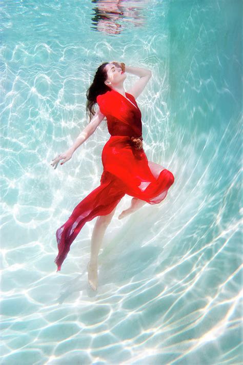 Mixed Race Woman In Dress Underwater In By Ming H2 Wu