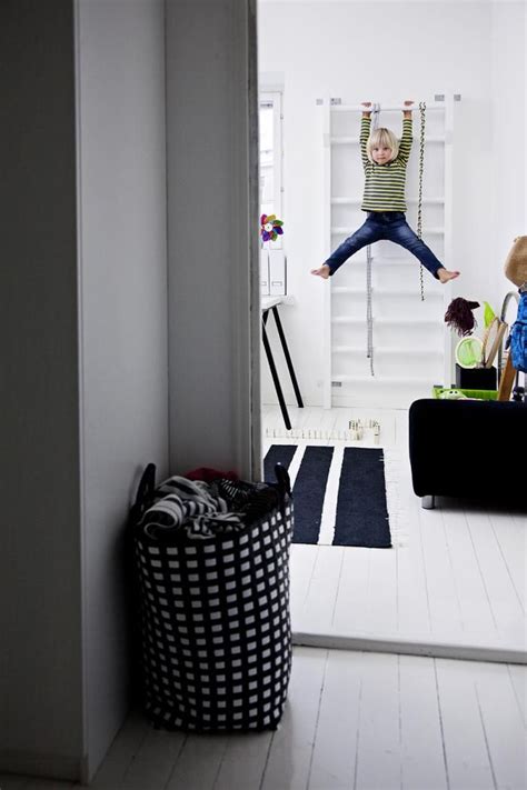 Onto the other side of the room… the rock climbing wall. Indoor swinging sliding spaces | White kids room, Kids ...