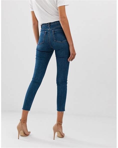 ASOS Denim Ridley High Waisted Skinny Jeans In Mid Wash Blue With Front