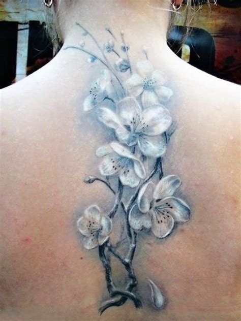 Black And White Orchid Tattoo On Upper Back For Girls Beautiful
