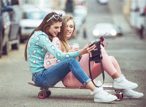 Hipster Girlfriends Taking A Selfie In Urban City Context Concept Of