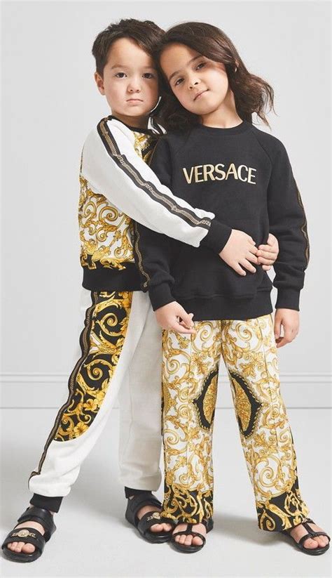 Young Versace White Baroque Tracksuit And Black Logo Sweatshirt Kids