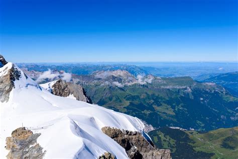 View From Jungfraujoch Platform To The Bernese Alps In Switzerland
