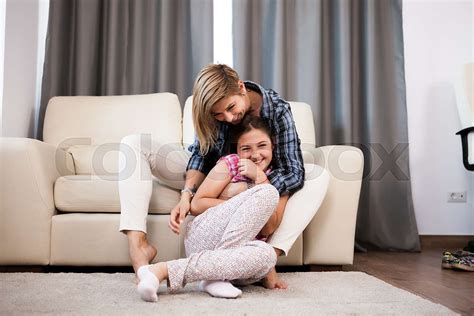 Mother Is Cuddling Her Teenage Daughter Stock Image Colourbox