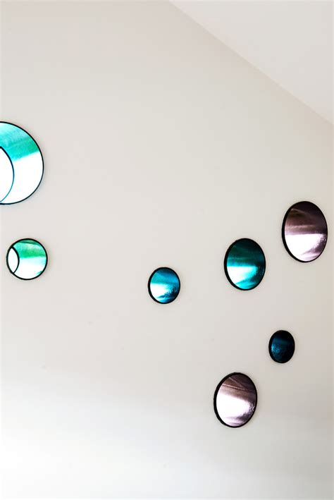 This Bedroom Wall Has Some Whimsical Porthole Windows