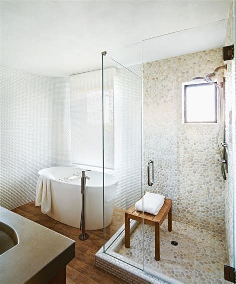They give it an elegant and timeless look and they go really well with transparent glass. 30 cool pictures and ideas pebble shower floor tile 2021