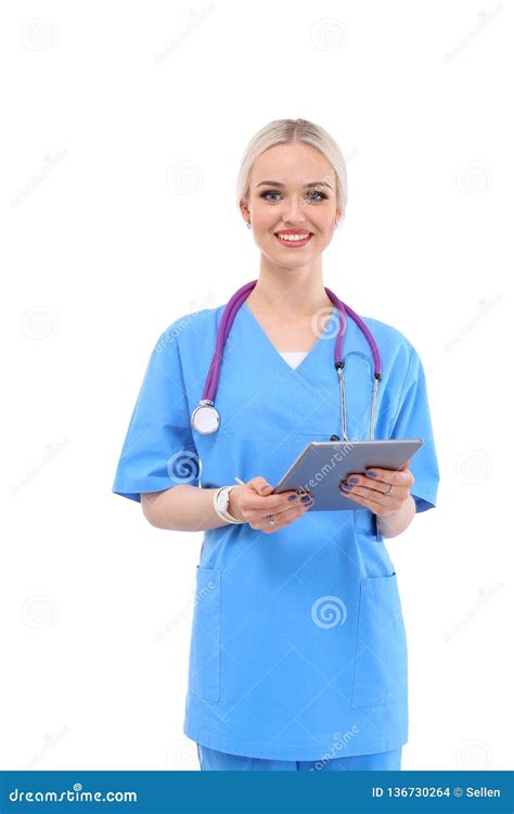 Female Doctor Using A Digital Tablet And Standing On White Background